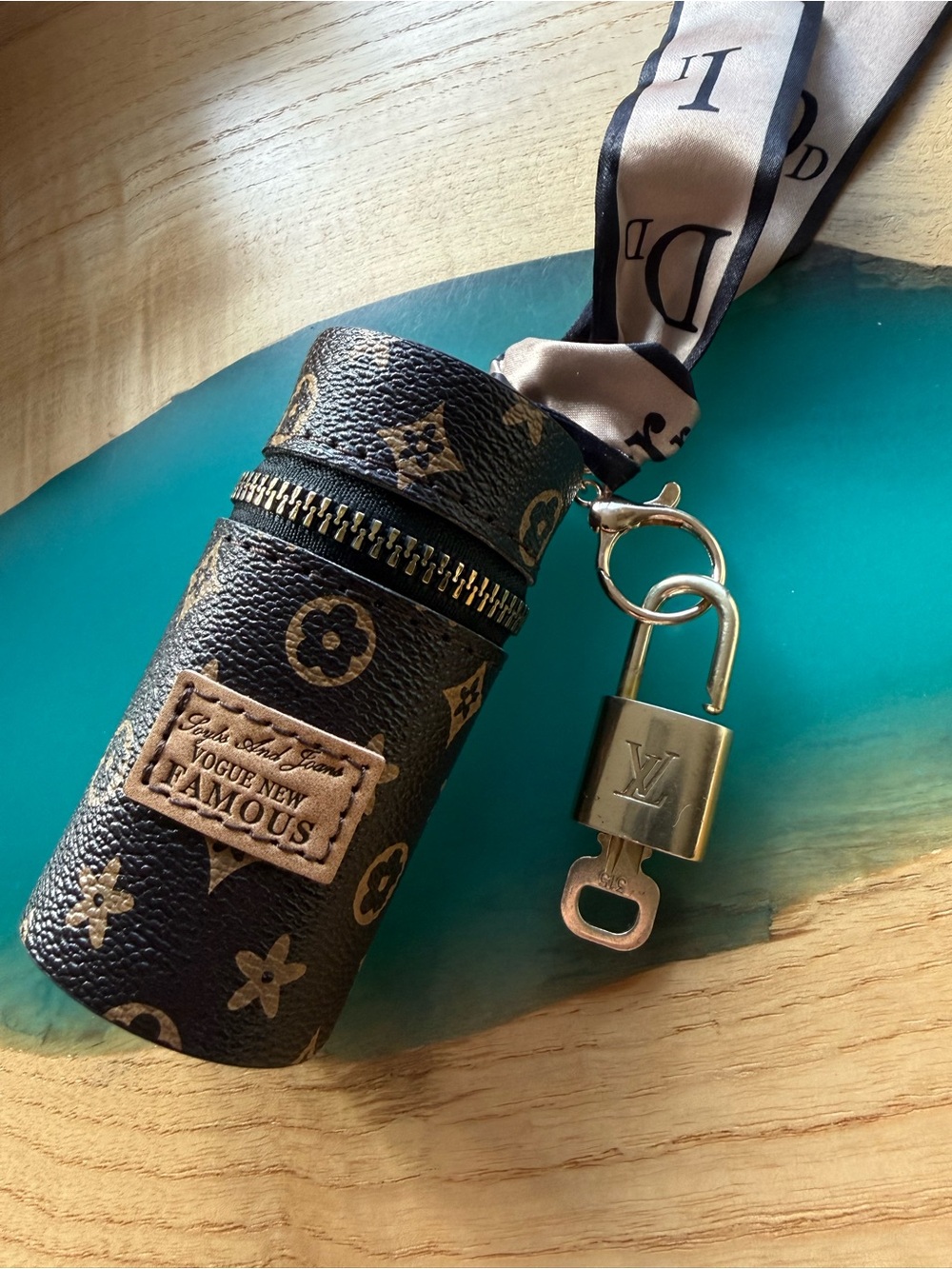 Louis Vuitton Genuine Brass Key. We are giving away the bag charm for free